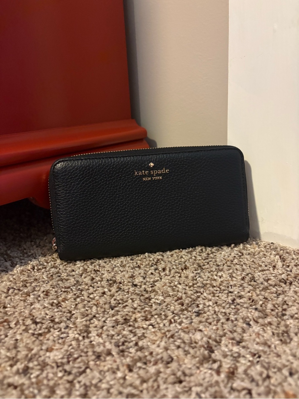 kate spade Black Pebbled Leather Zip Wallet with Gold Logo
